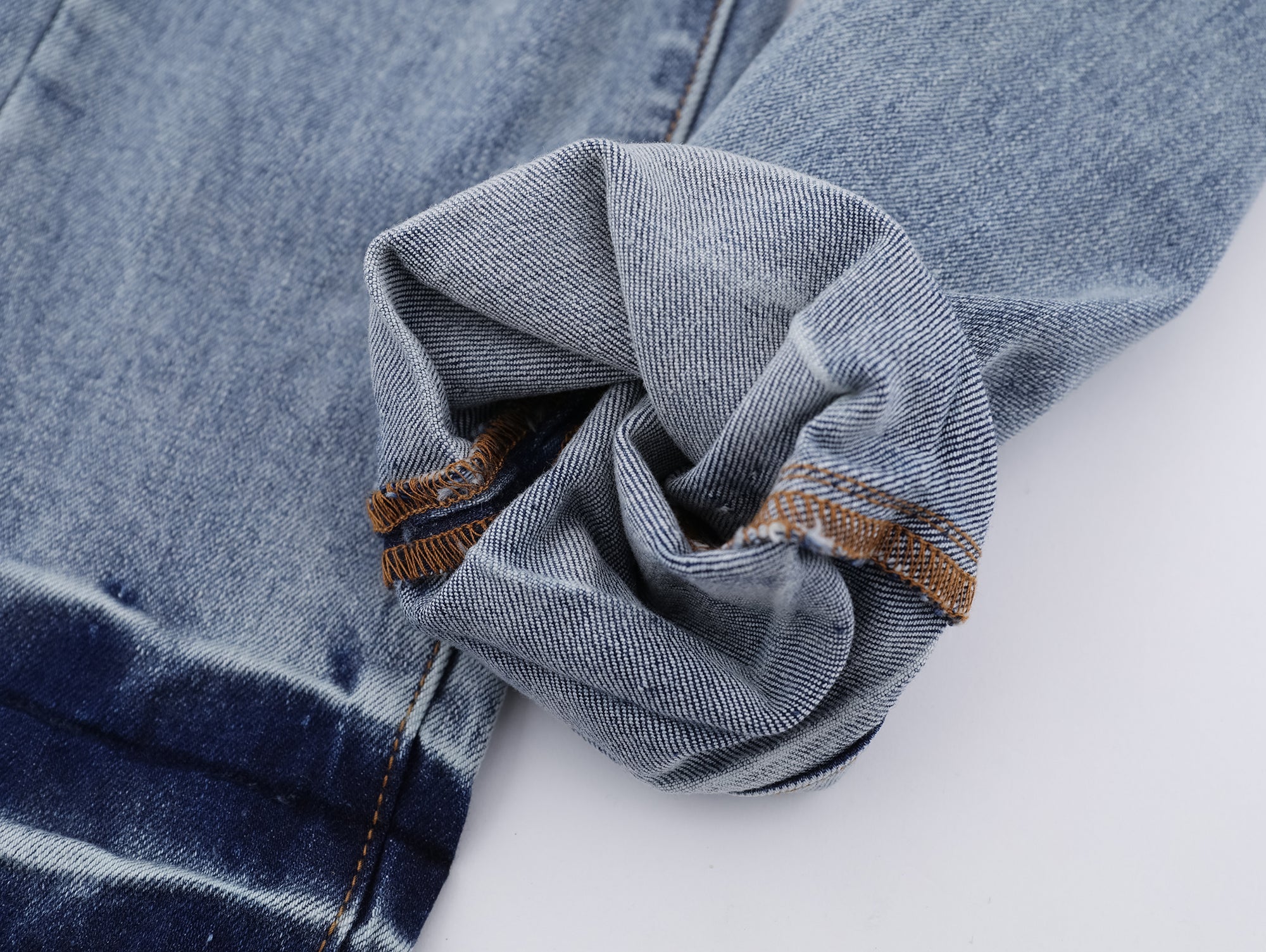 P117 Distressed Low Cuffed Jeans