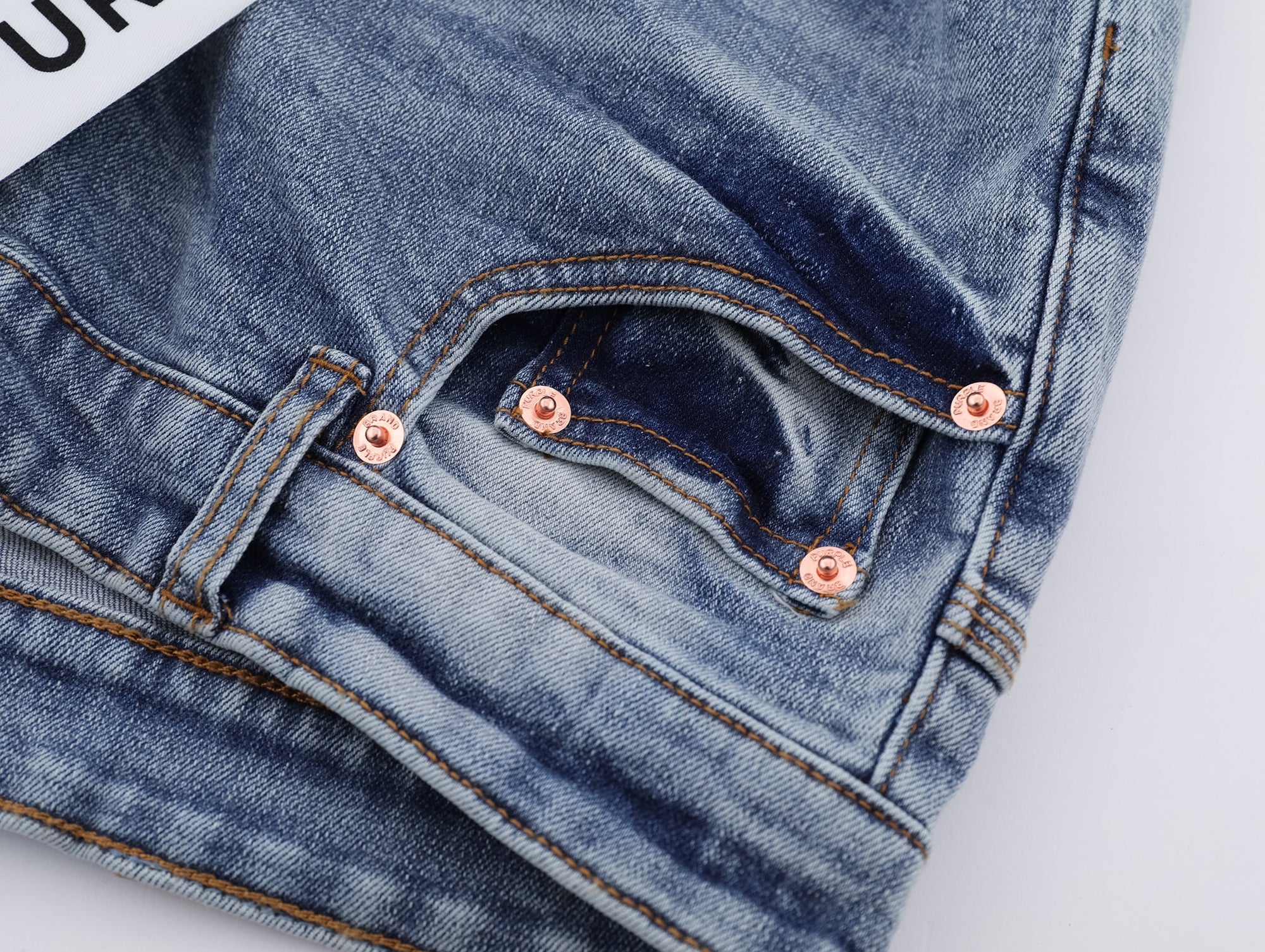 P117 Distressed Low Cuffed Jeans
