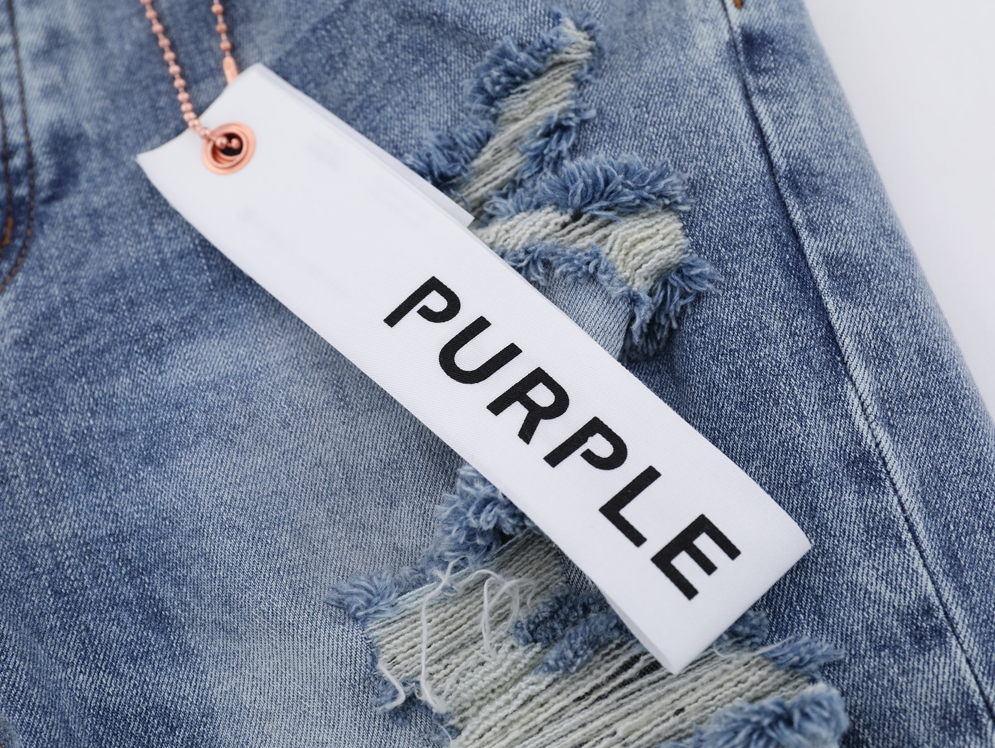 P117 Distressed Low Cuffed Jeans