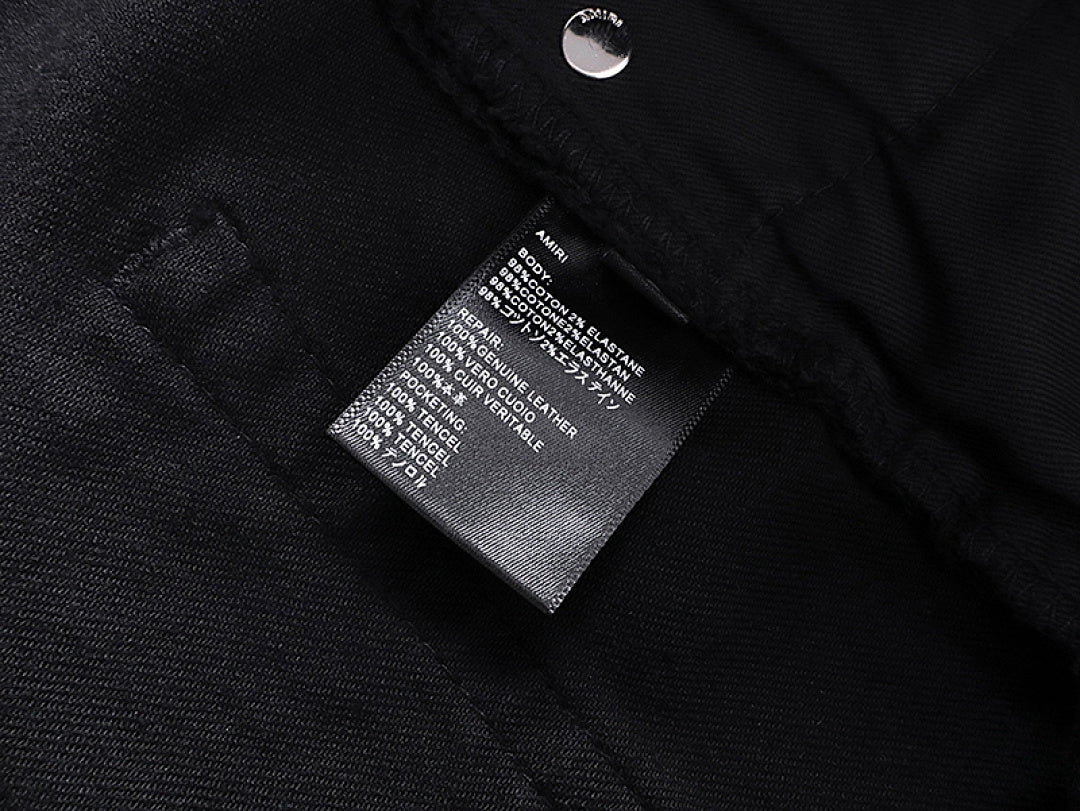 Amiri rhinestone-embellished black jeans