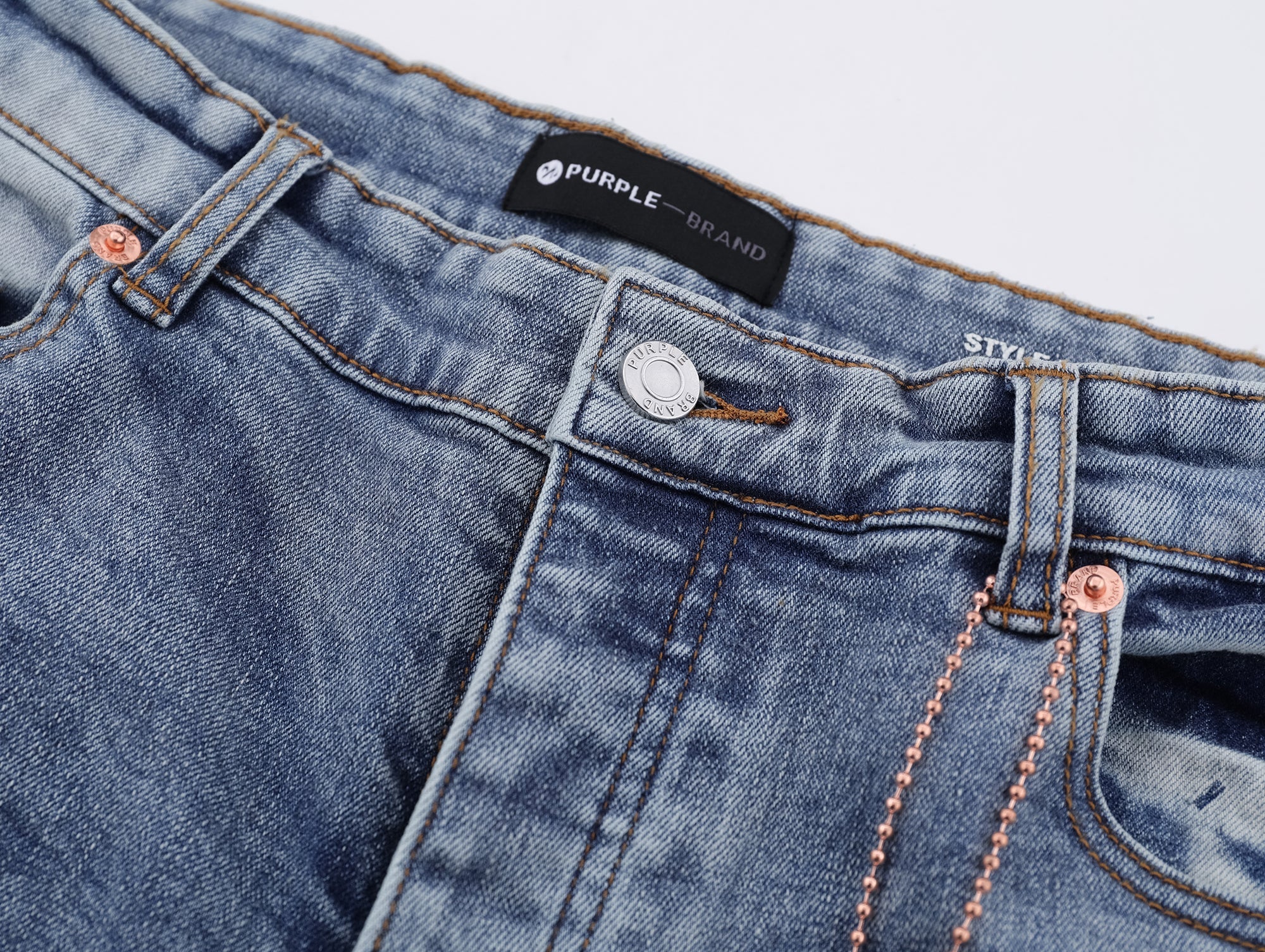 P117 Distressed Low Cuffed Jeans