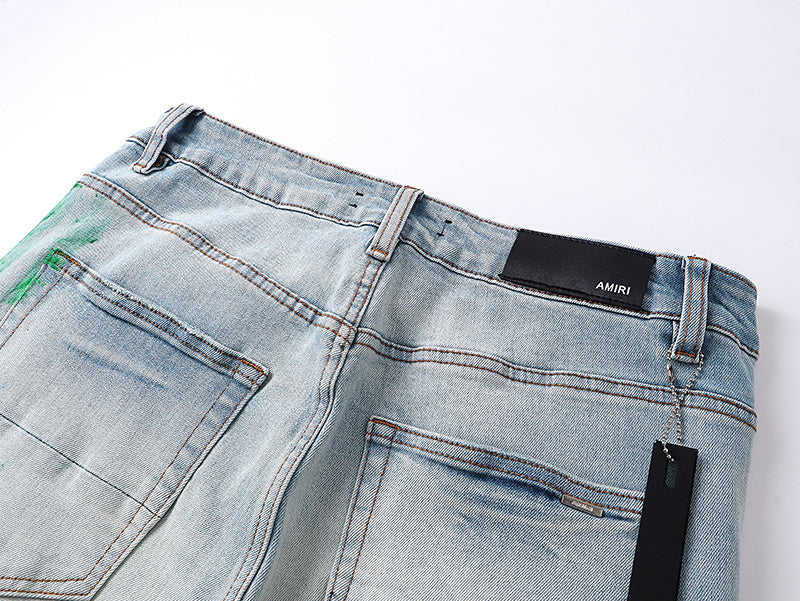 Amiri Staggered Logo Painted Jeans