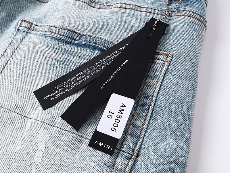 Amiri Staggered Logo Painted Jeans