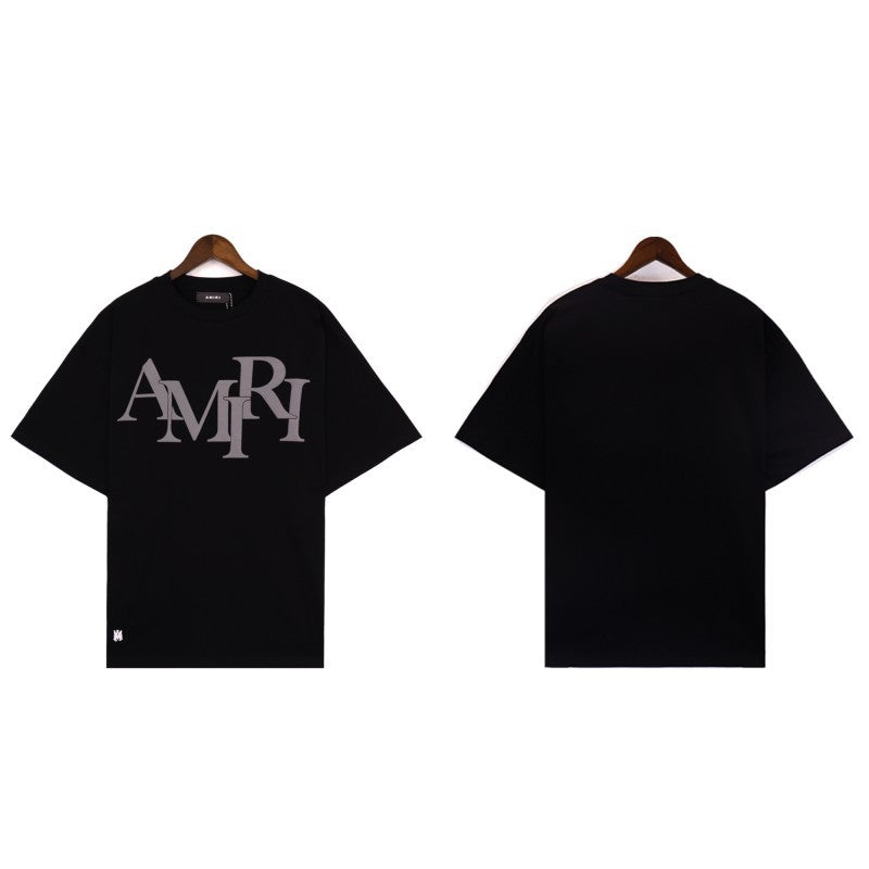 AM 'Staggered Logo Black' Tee