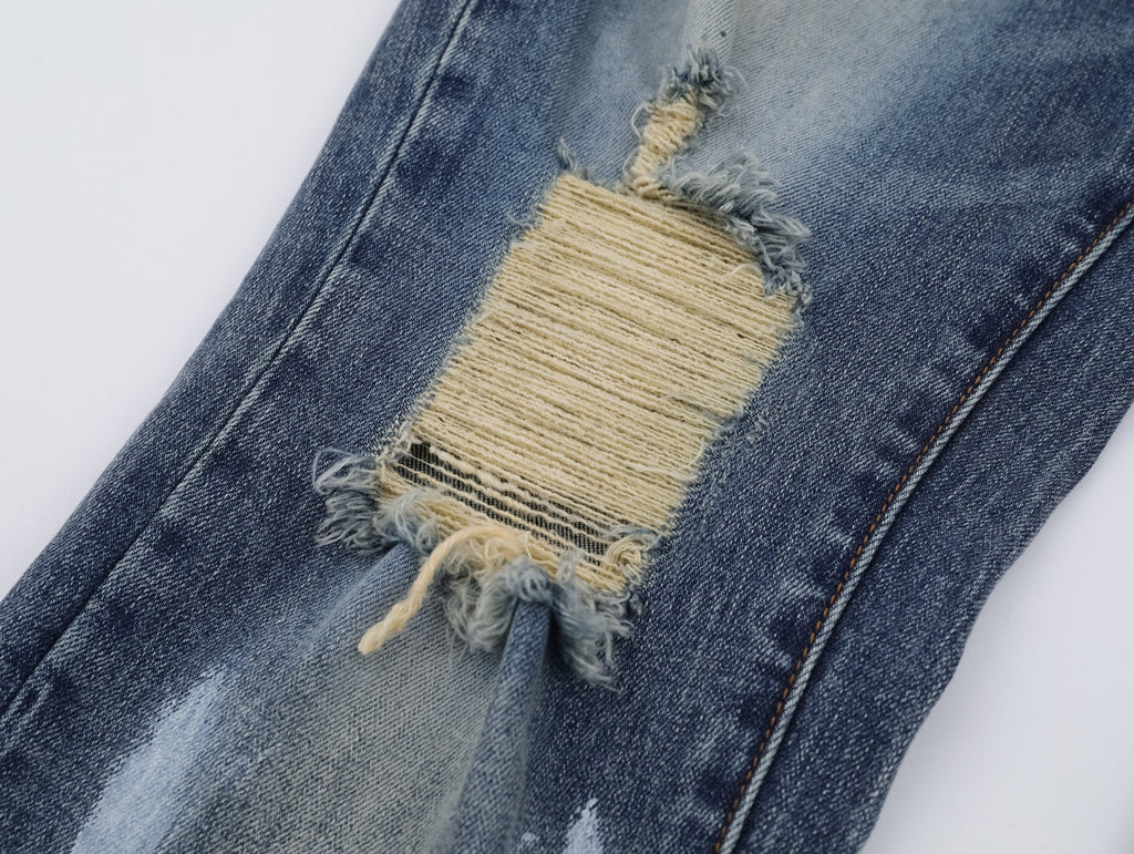 P123 Ripped Jeans