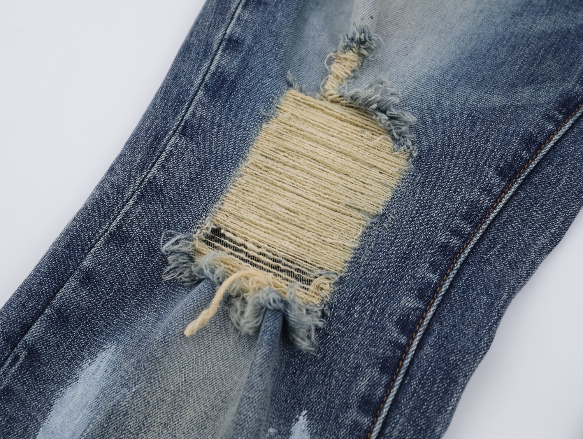 P123 Ripped Jeans